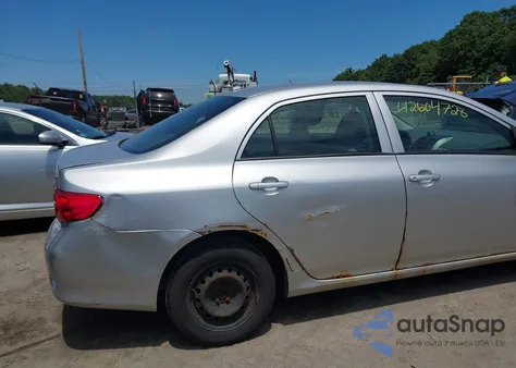 2009 Toyota Corolla Le from USA, damaged, VIN 2T1BU40E39C069784